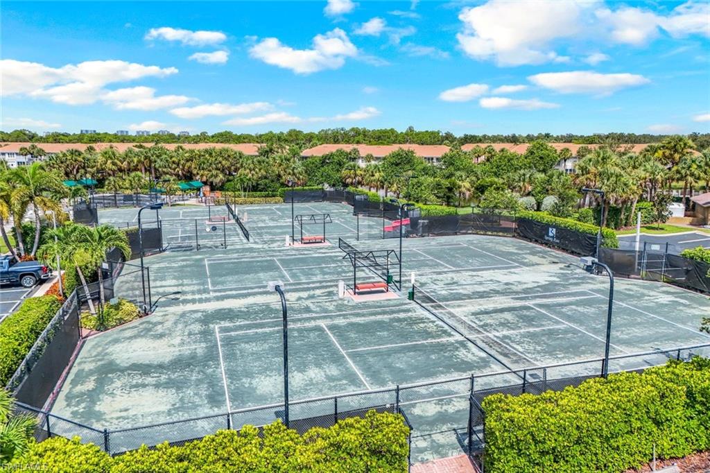 9331 Spring Run Boulevard, Unit 3003 Estero, FL 34135 - Photo 35 of 47 a view of a terrace with sitting area