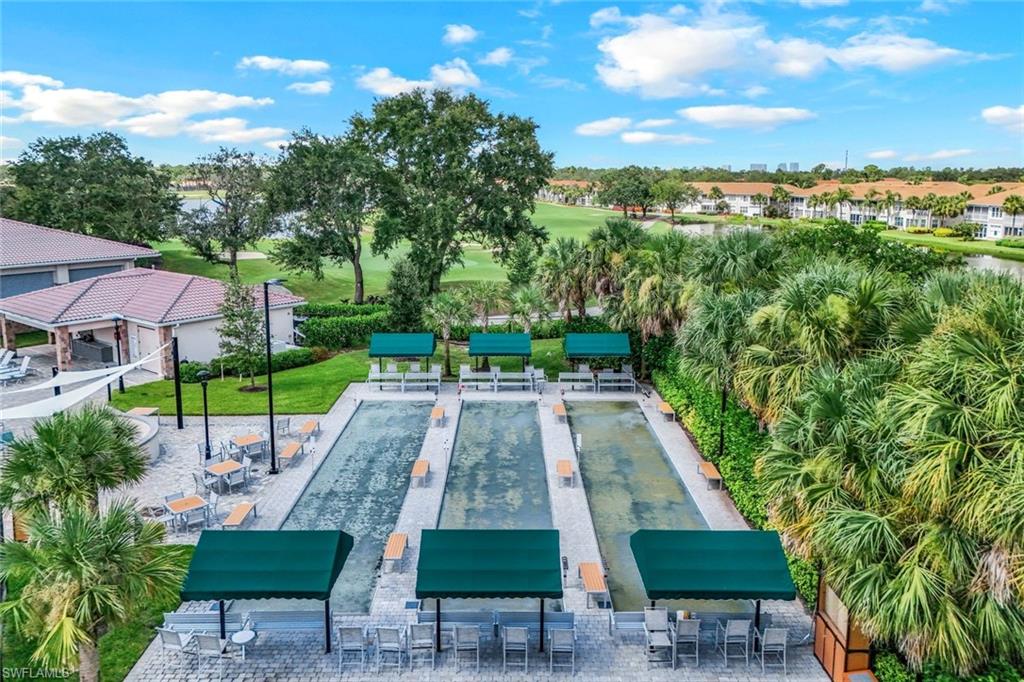 9331 Spring Run Boulevard, Unit 3003 Estero, FL 34135 - Photo 37 of 47 an aerial view of a house with a yard