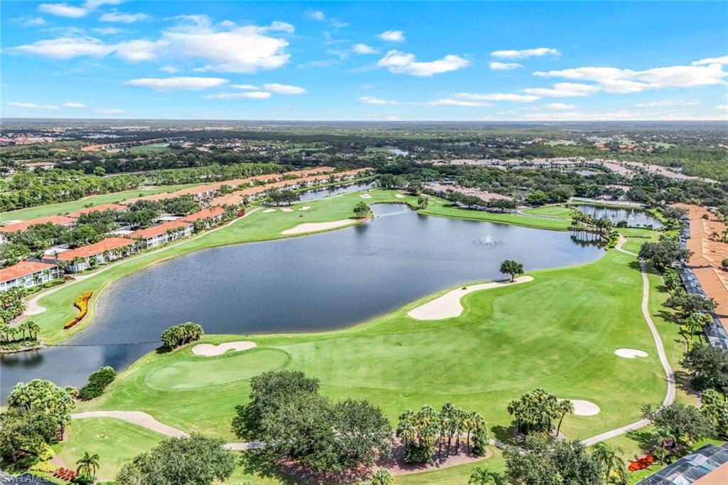 9331 Spring Run Boulevard, Unit 3003 Estero, FL 34135 - Photo 40 of 47 an aerial view of a residential houses with outdoor space