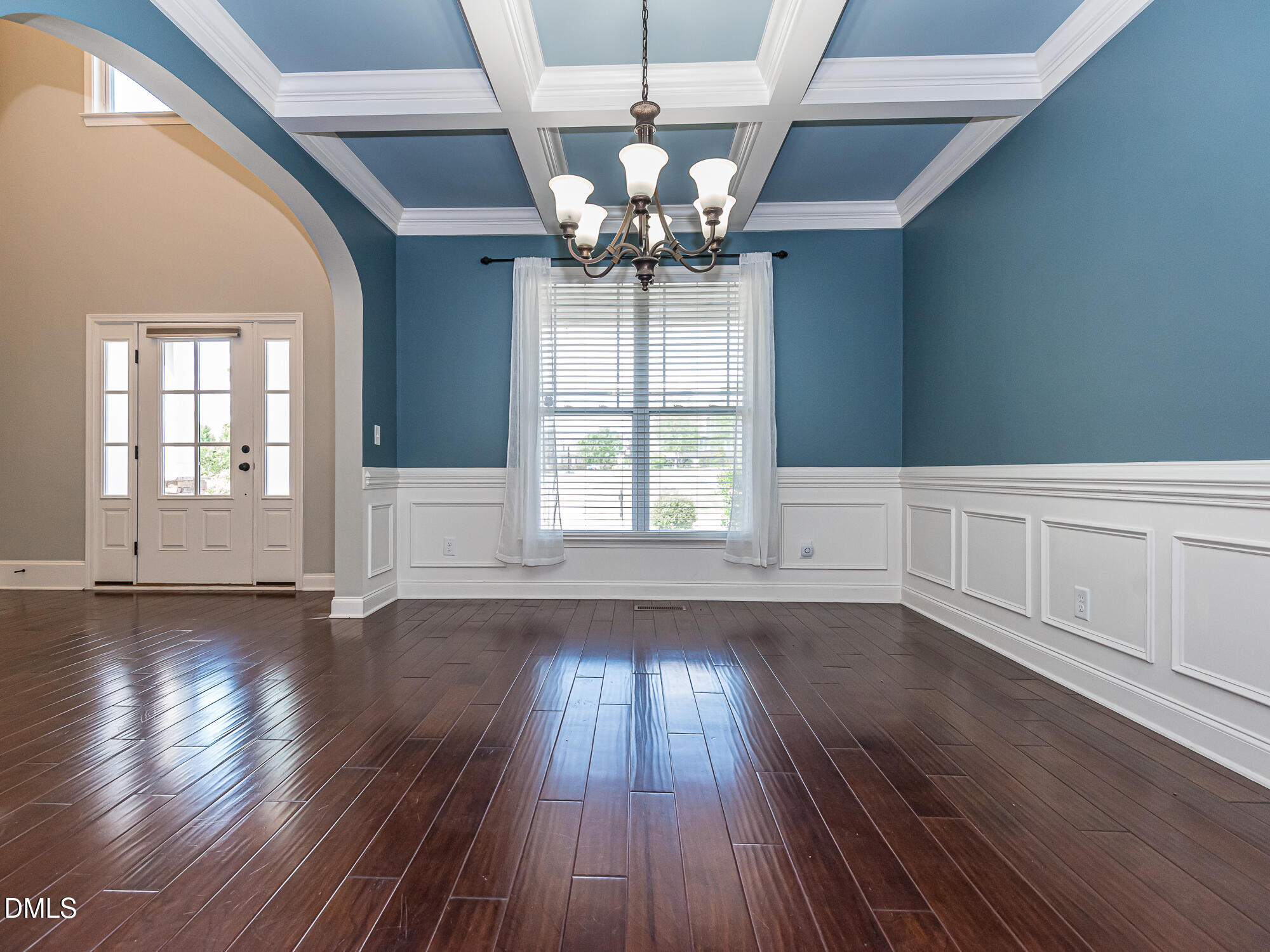 337 Shadowdale Lane Rolesville, NC 27571 - Photo 17 of 42 a view of an empty room with wooden floor and a window