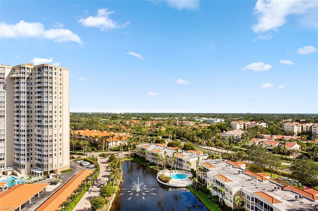 6573 Marissa Loop, Unit 1203 Naples, FL 34108 - Photo 20 of 22 an aerial view of residential building and lake view