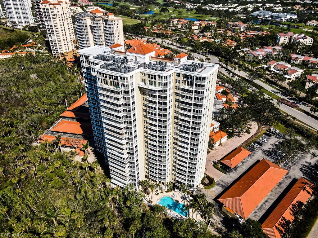 6573 Marissa Loop, Unit 1203 Naples, FL 34108 - Photo 21 of 22 an aerial view of residential building and tree