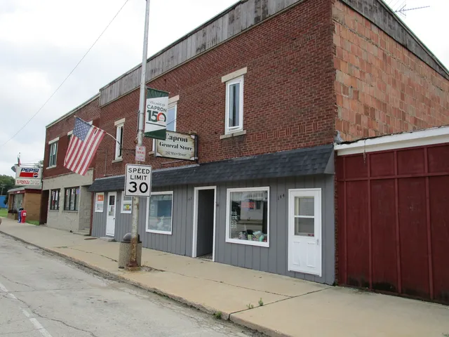 a front view of a house with a garage