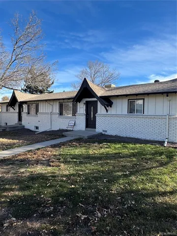 a house view with a garden space