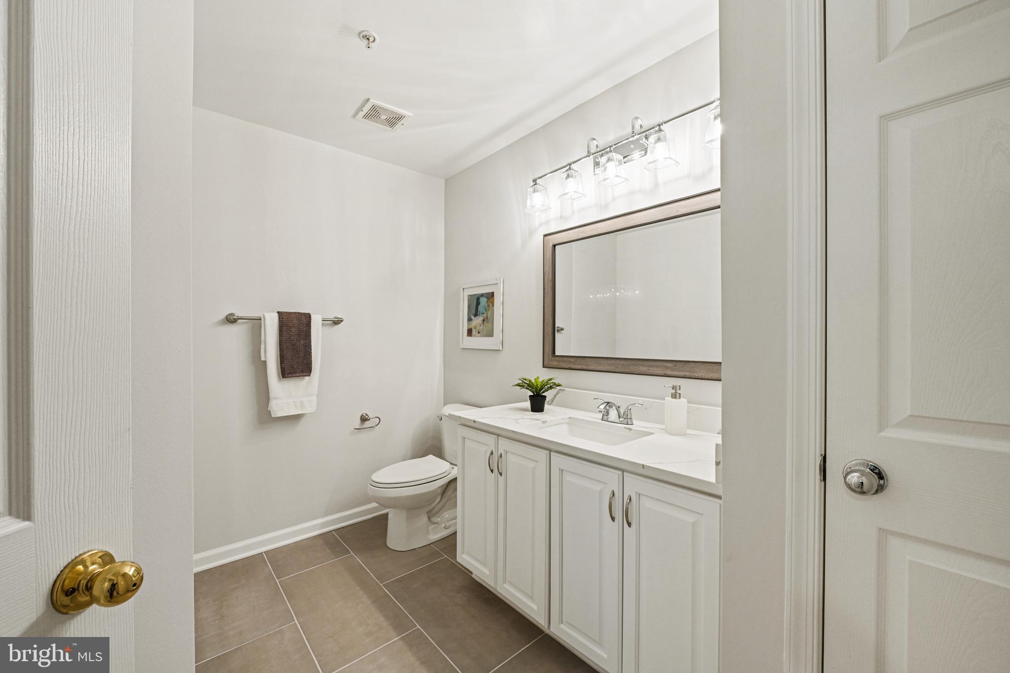 11400 Windleaf Court, Unit 41 Reston, VA 20194 - Photo 24 of 31 Upper Hall full bath has been updated, too