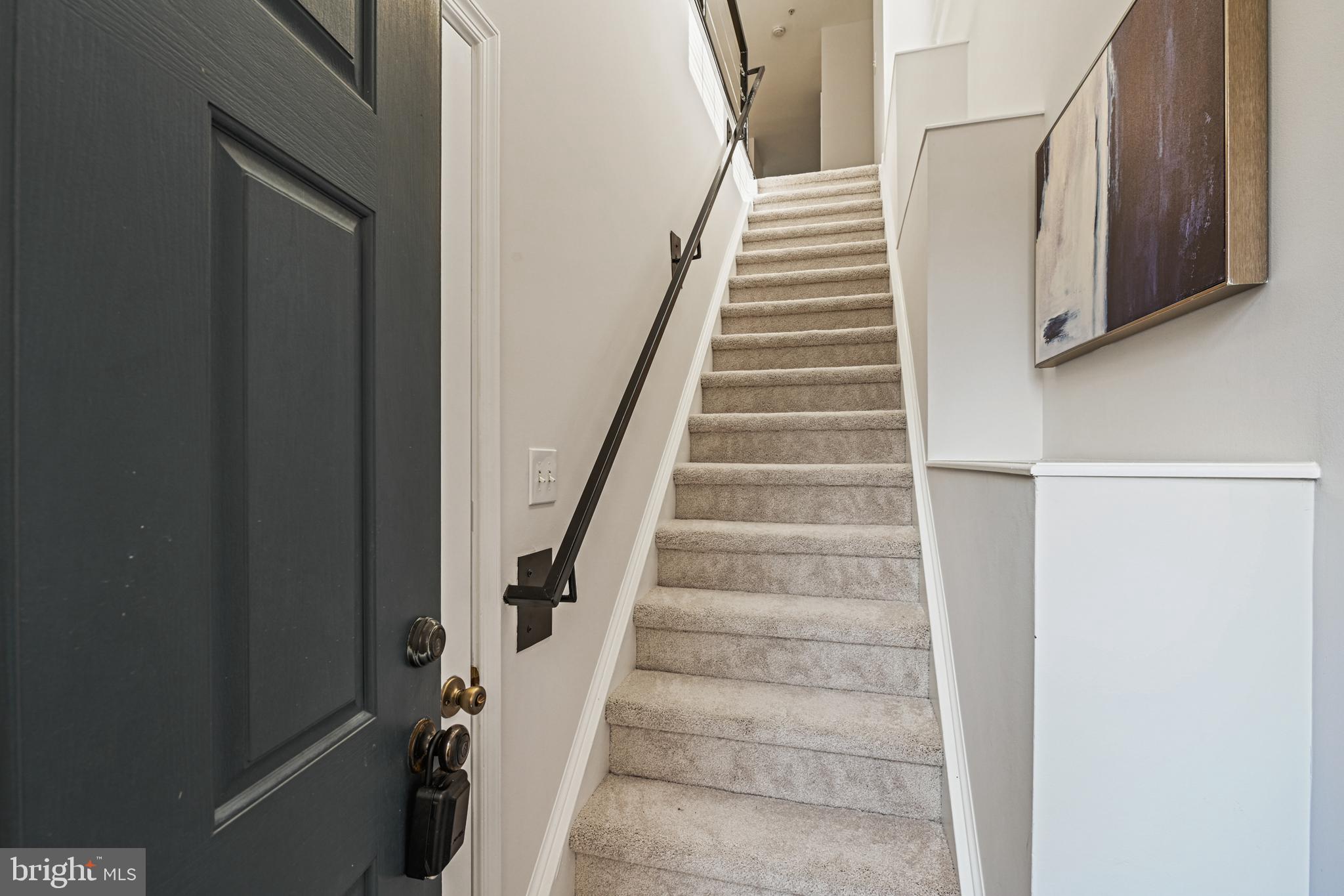 11400 Windleaf Court, Unit 41 Reston, VA 20194 - Photo 4 of 31 Welcome in! Door from the garage is on the left.