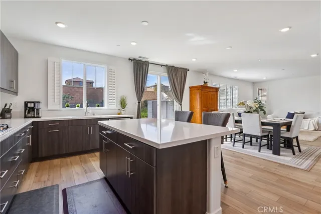 a living room with furniture a window and a fireplace