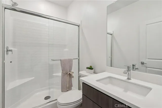 a bed room with a bed and a window