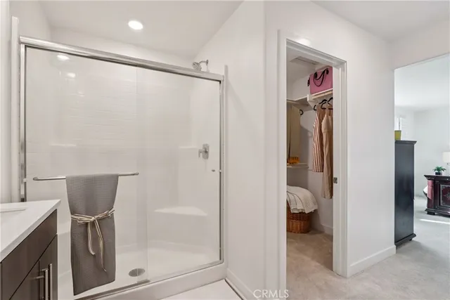 an aerial view of a house with a yard table and chairs