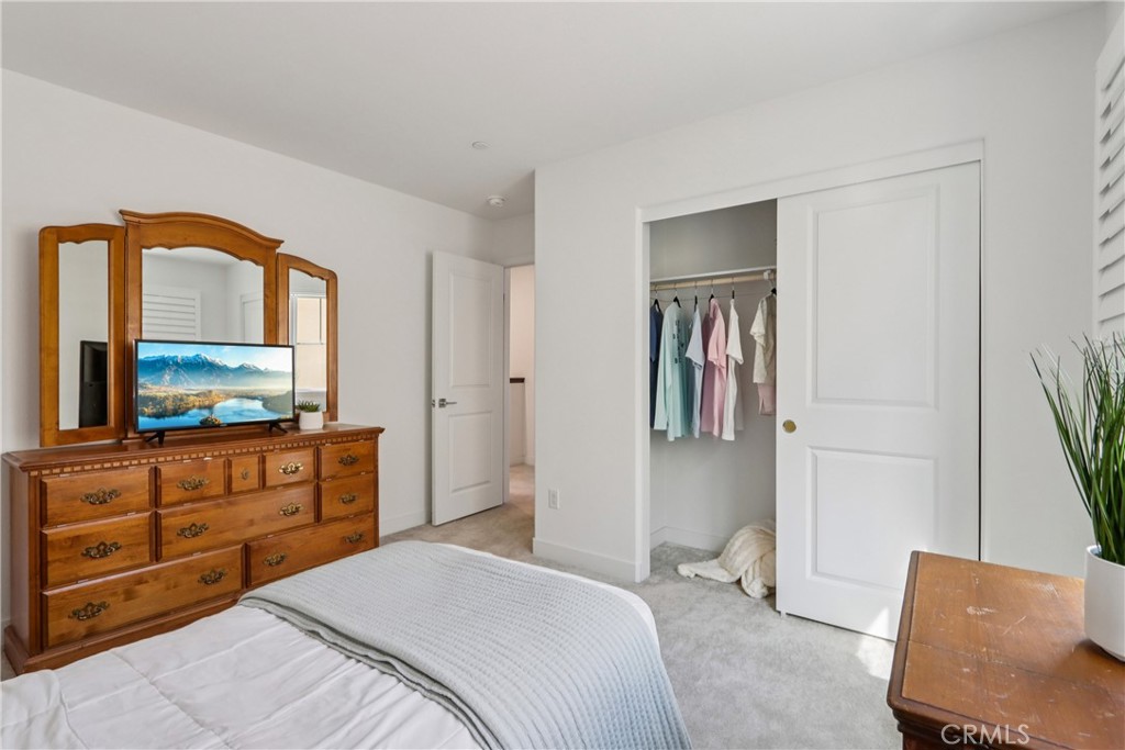 2464 Yellowstone Way Rialto, CA 92377 - Photo 41 of 75 a bedroom with a bed and a flat screen tv