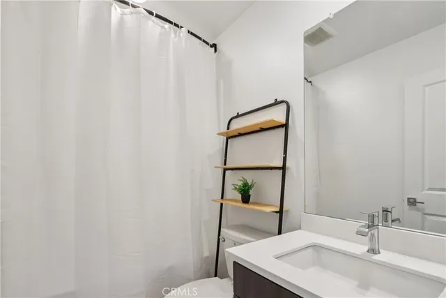 a aerial view of a house with a yard