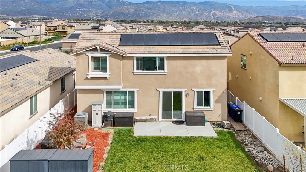 2464 Yellowstone Way Rialto, CA 92377 - Photo 50 of 75 an aerial view of a house with a yard table and chairs