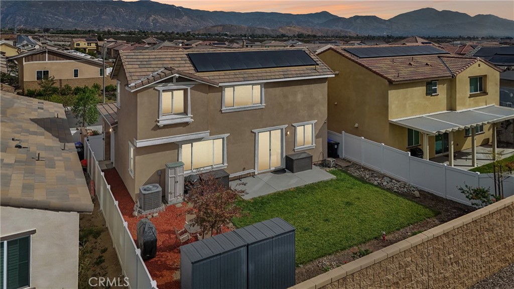 2464 Yellowstone Way Rialto, CA 92377 - Photo 55 of 75 a aerial view of a house with a yard