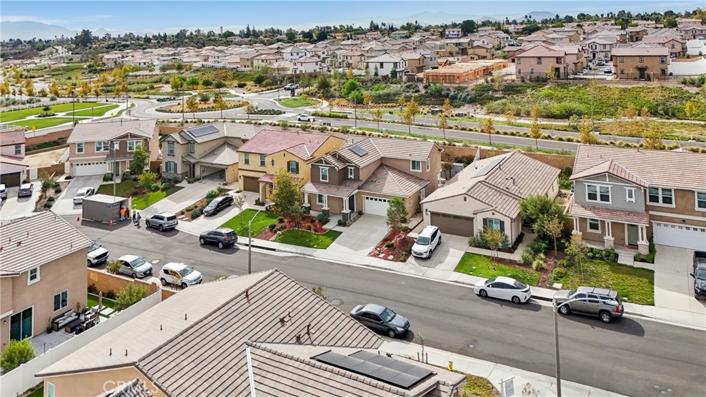 2464 Yellowstone Way Rialto, CA 92377 - Photo 60 of 75 an aerial view of residential houses with outdoor space