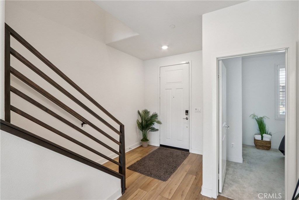 2464 Yellowstone Way Rialto, CA 92377 - Photo 6 of 75 a view of a hallway and a livingroom with furniture