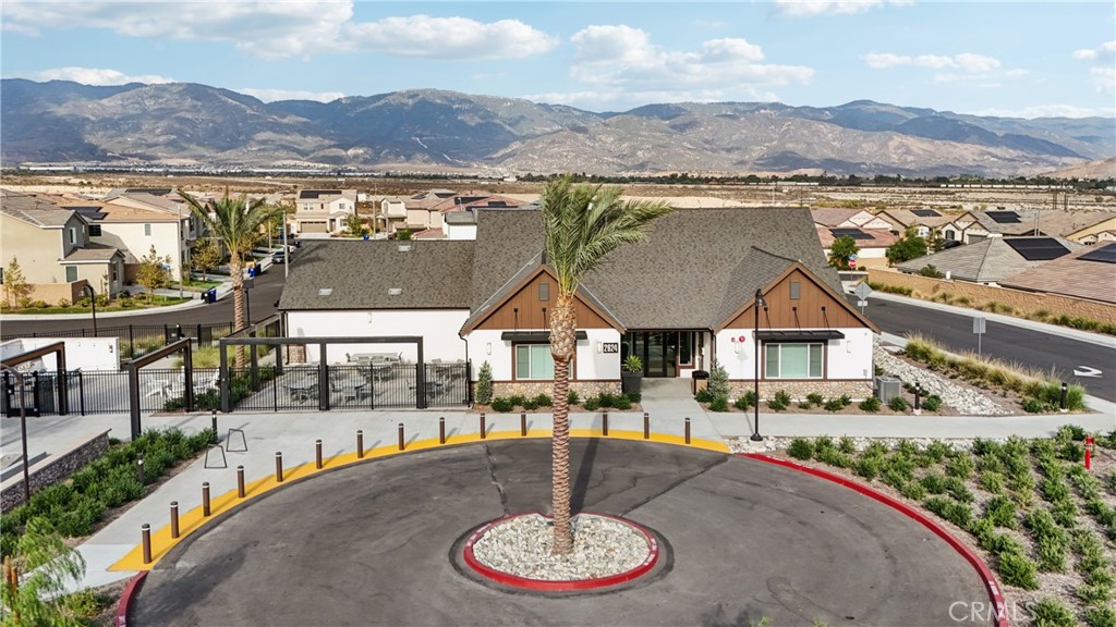 2464 Yellowstone Way Rialto, CA 92377 - Photo 63 of 75 an aerial view of a house with a garden and lake view