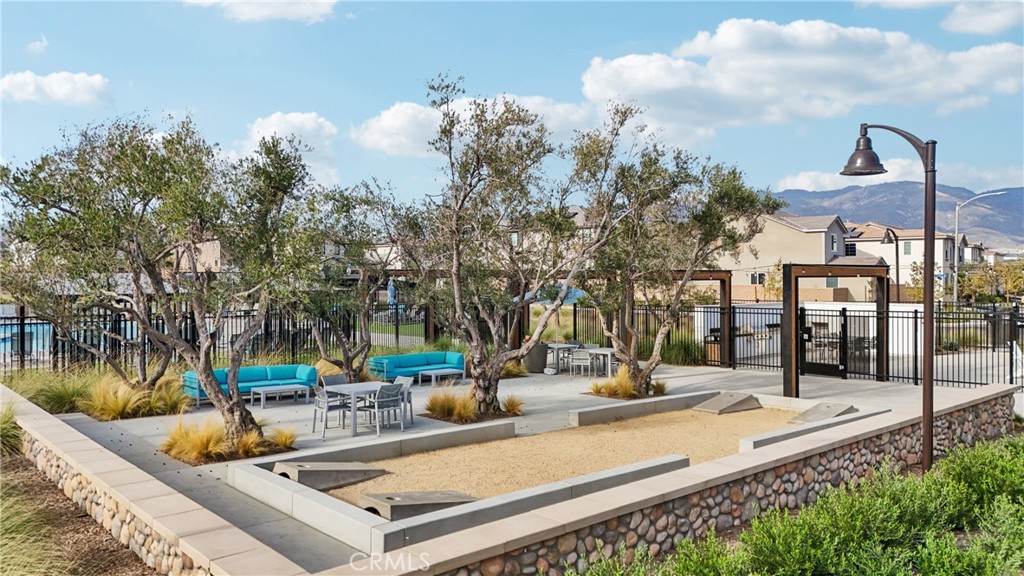 2464 Yellowstone Way Rialto, CA 92377 - Photo 64 of 75 a view of a swimming pool with a patio