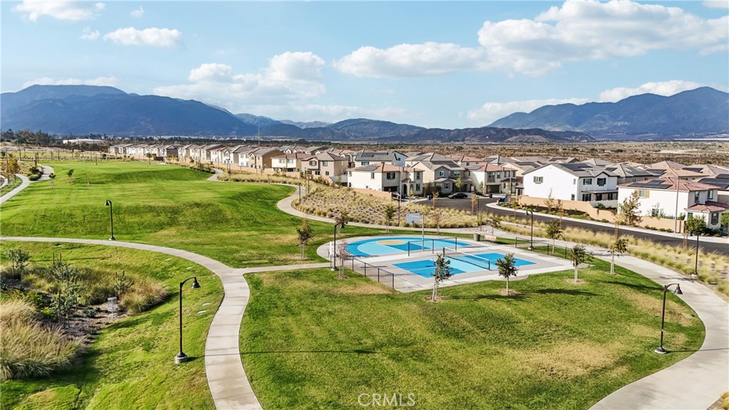 2464 Yellowstone Way Rialto, CA 92377 - Photo 67 of 75 a view of a swimming pool with a lake view