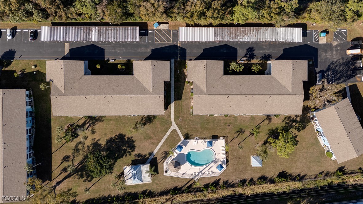 1100 Pondella Road, Unit 801 Cape Coral, FL 33909 - Photo 16 of 24 an aerial view of a house with yard