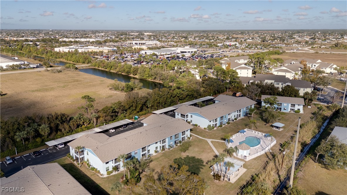 1100 Pondella Road, Unit 801 Cape Coral, FL 33909 - Photo 23 of 24 an aerial view of residential houses with outdoor space