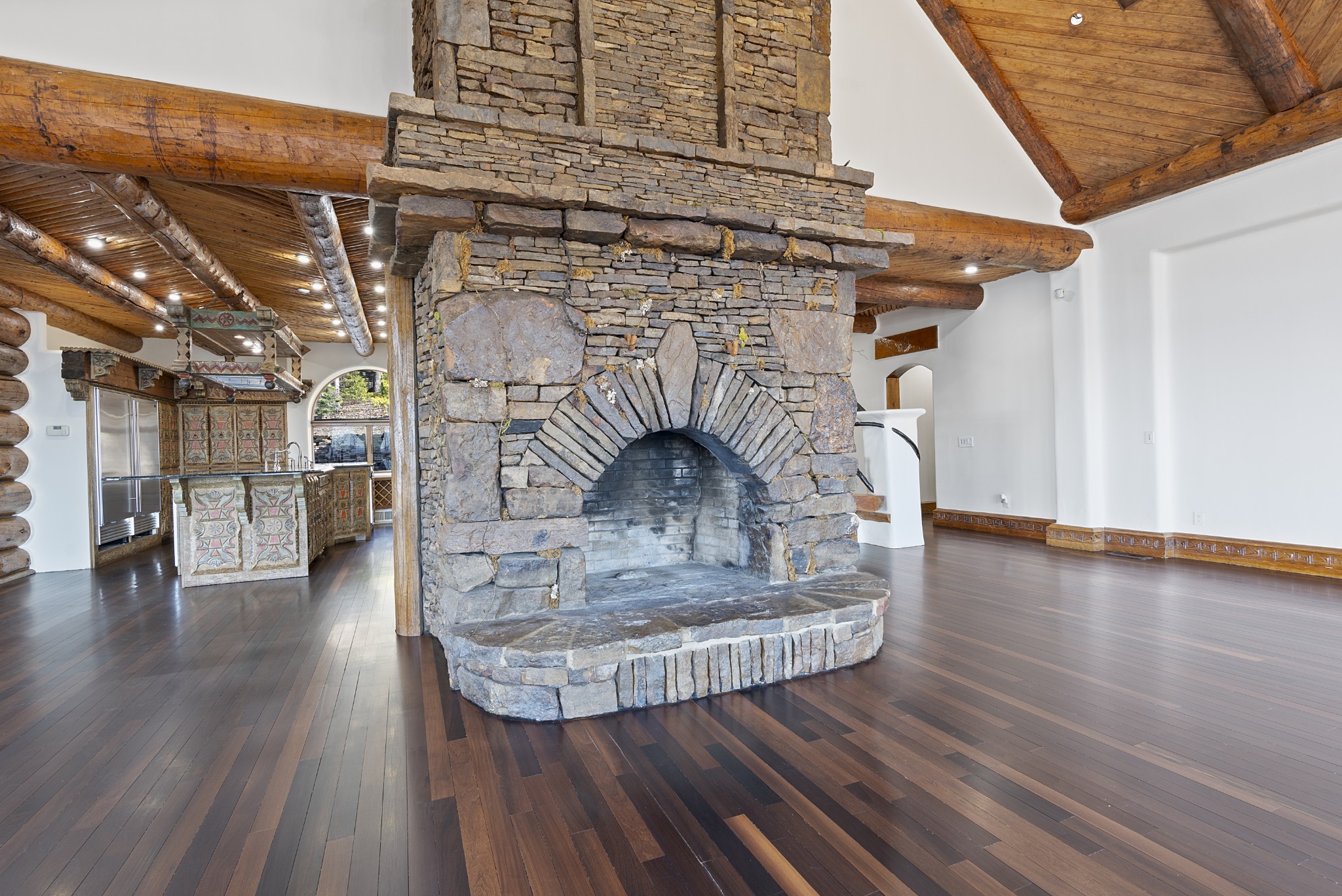 721 Three Point Road Muscle Shoals, AL 35661 - Photo 15 of 51 a living room with wooden floors and fireplace