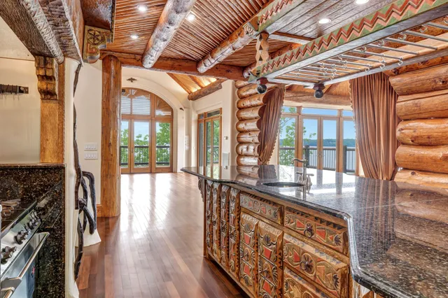 a view of a balcony with chairs