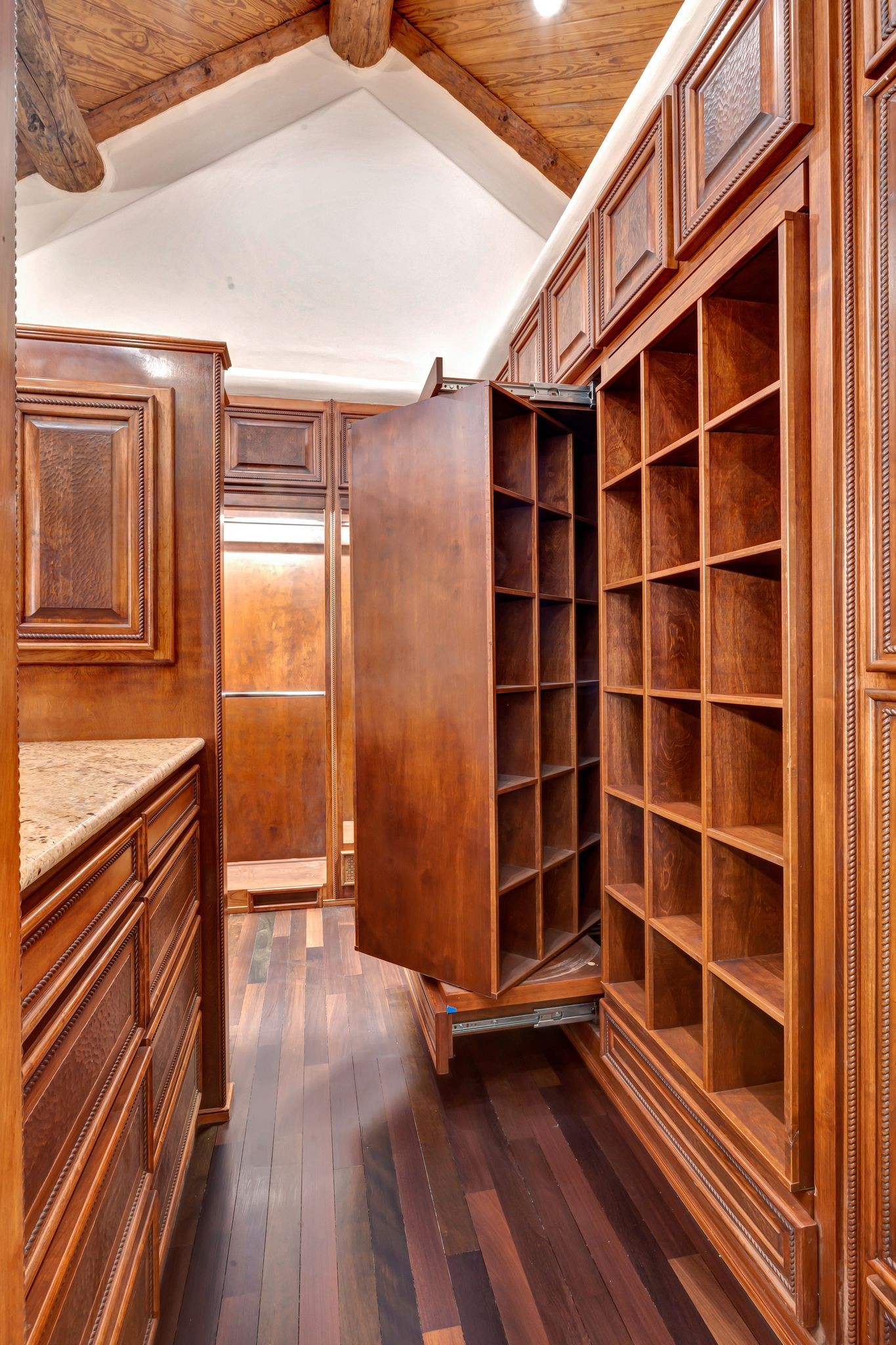 721 Three Point Road Muscle Shoals, AL 35661 - Photo 27 of 51 a view of an empty room with wooden floor and a cabinet