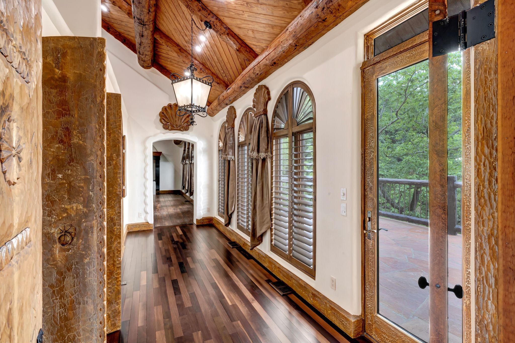 721 Three Point Road Muscle Shoals, AL 35661 - Photo 28 of 51 a view of a balcony with wooden floor