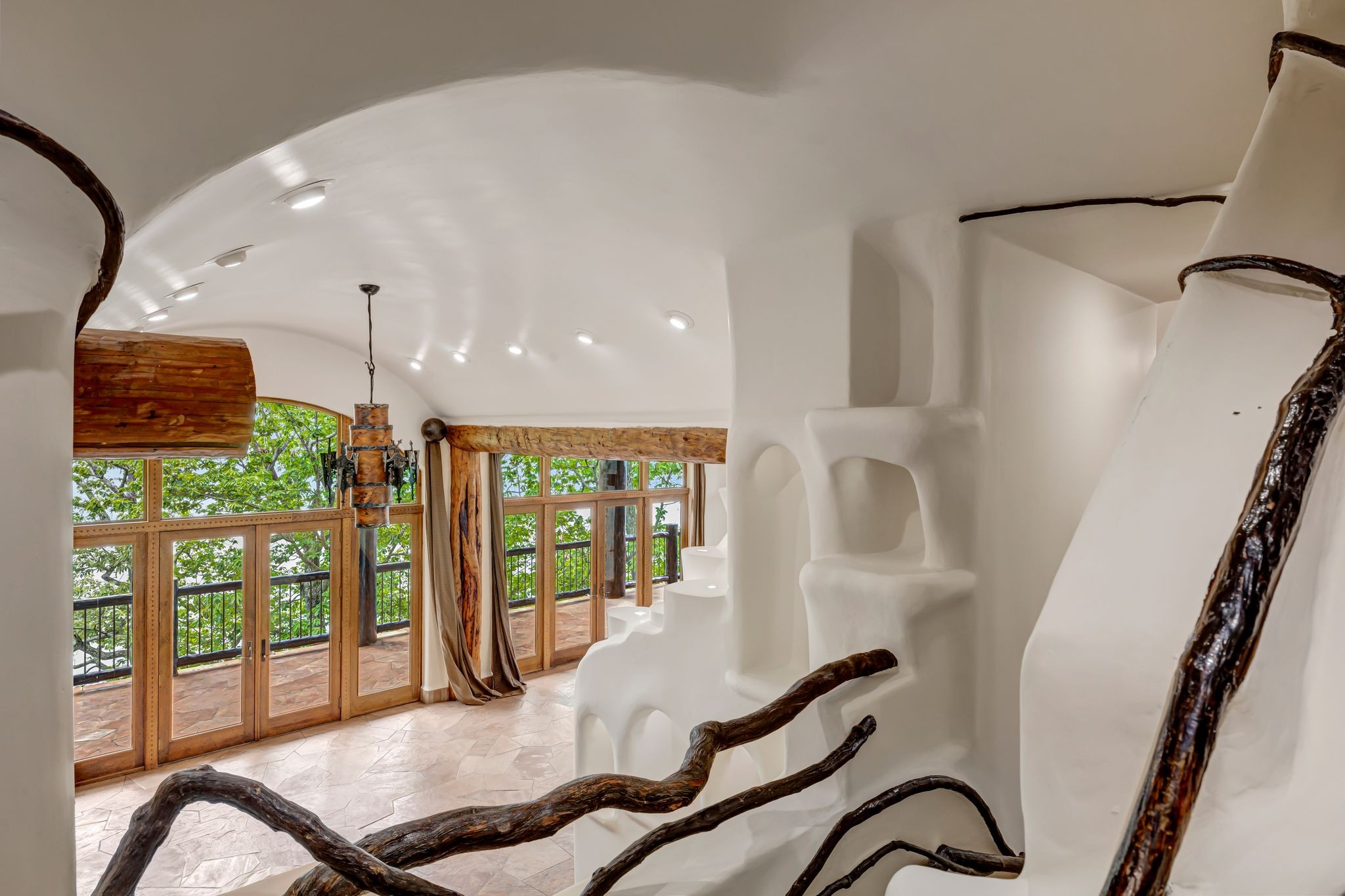 721 Three Point Road Muscle Shoals, AL 35661 - Photo 38 of 51 a room with furniture and a floor to ceiling window