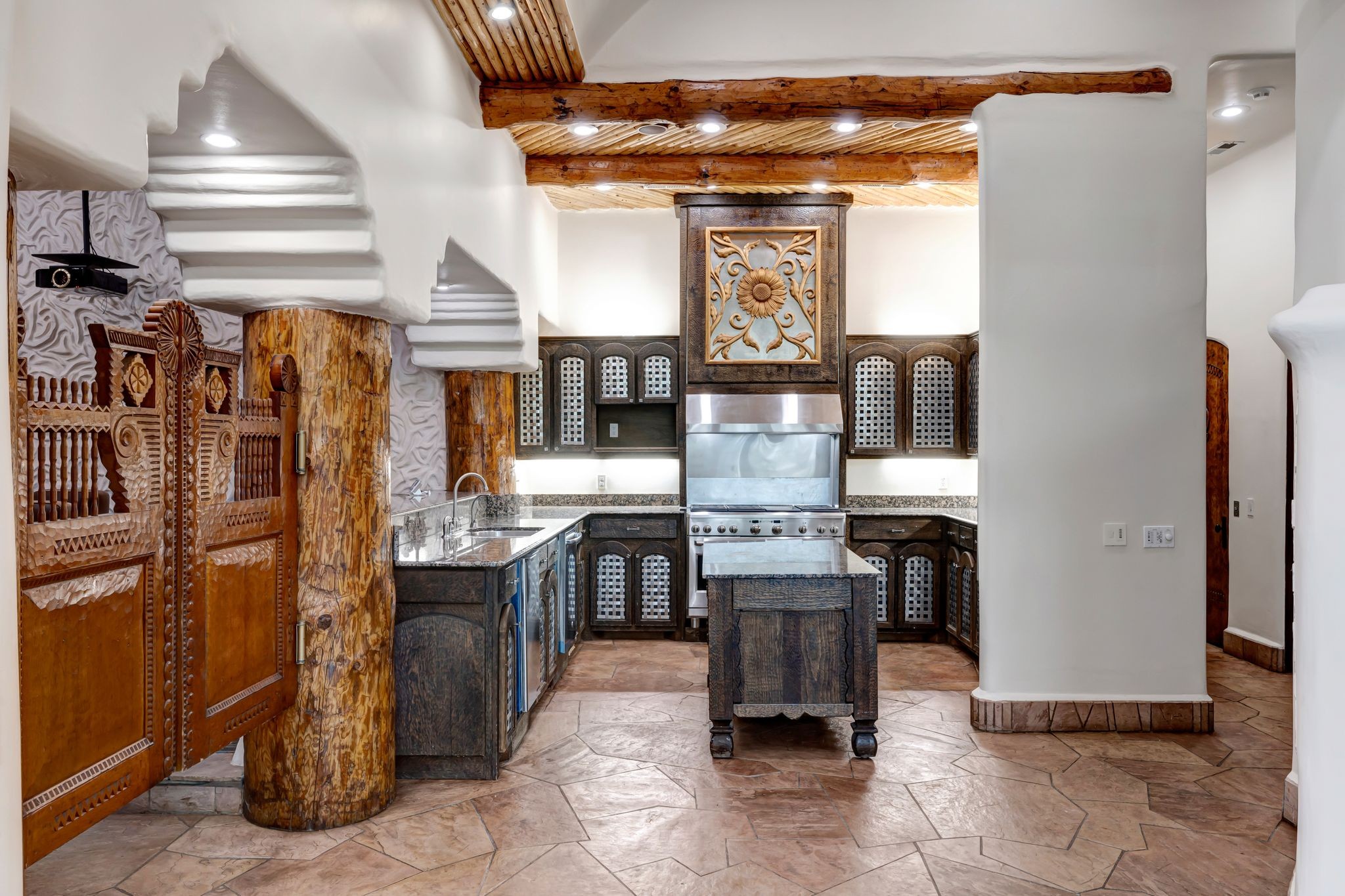721 Three Point Road Muscle Shoals, AL 35661 - Photo 42 of 51 a kitchen with stainless steel appliances granite countertop a stove and a refrigerator