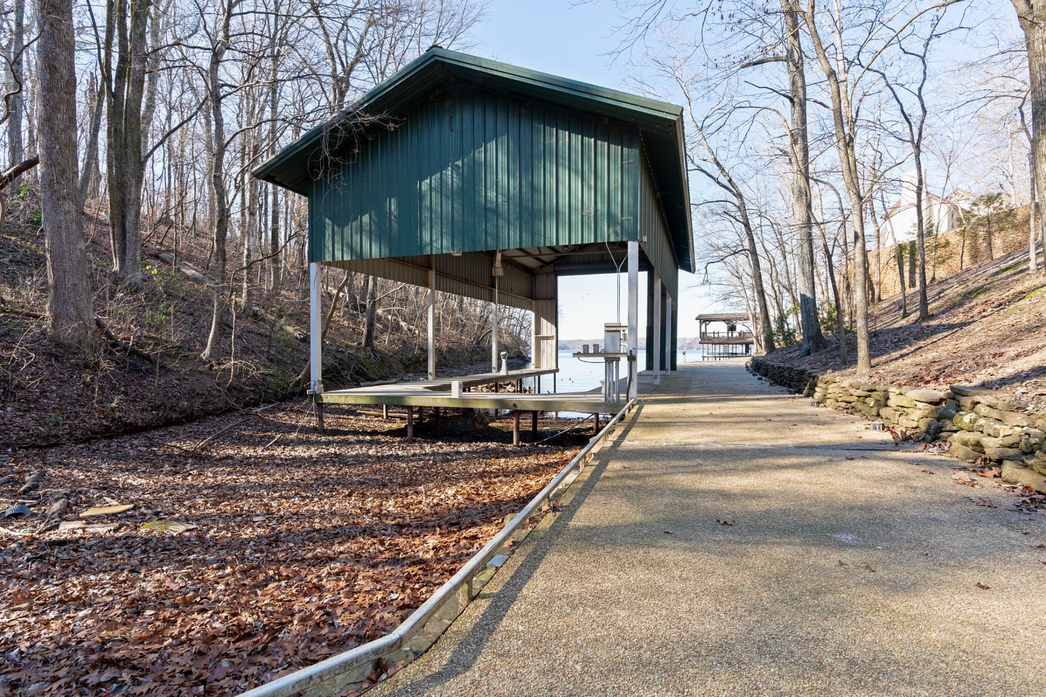 721 Three Point Road Muscle Shoals, AL 35661 - Photo 50 of 51 a view of a house with a yard covered in snow
