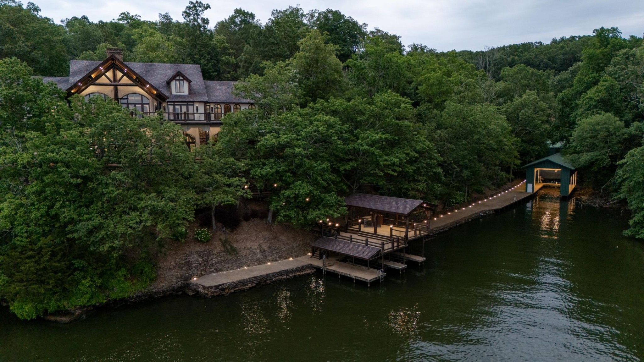 721 Three Point Road Muscle Shoals, AL 35661 - Photo 8 of 51 an aerial view of a house with swimming pool outdoor seating and yard