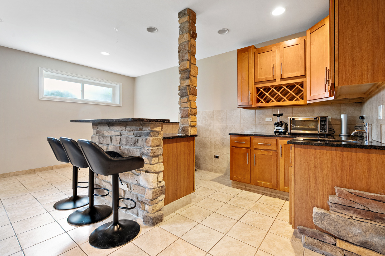 3638 North Odell Avenue Chicago, IL 60634 - Photo 18 of 46 a kitchen with a sink cabinets and window