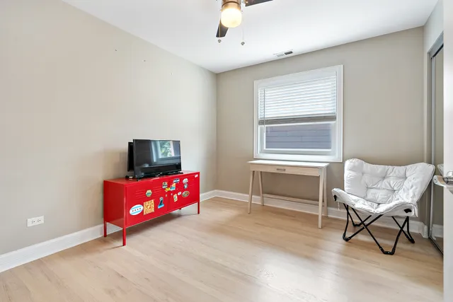a living room with a couch and a flat screen tv