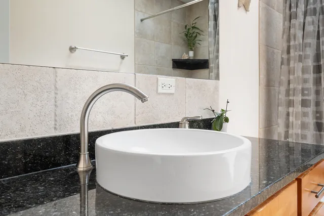 a white bath tub sitting in a bathroom