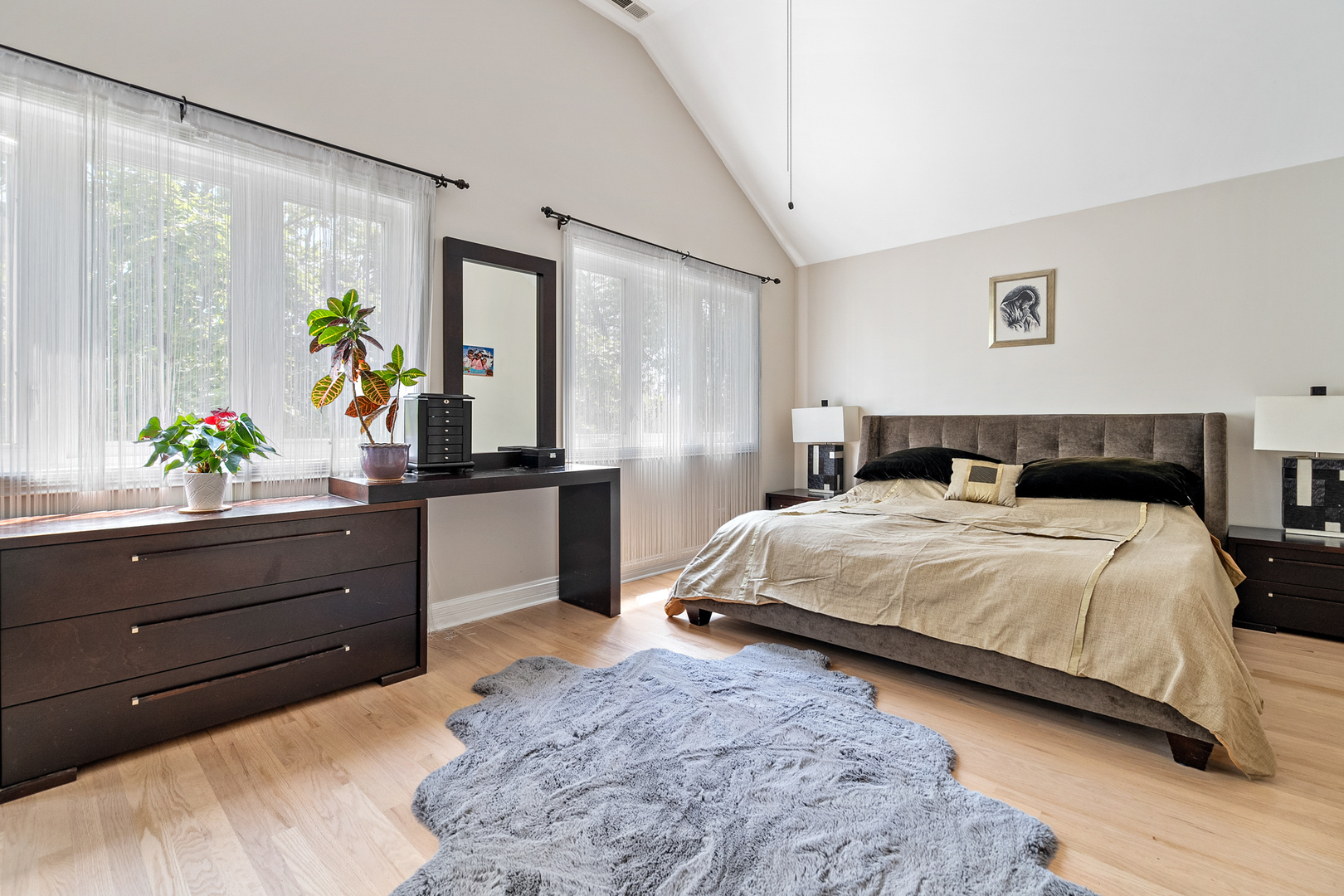 3638 North Odell Avenue Chicago, IL 60634 - Photo 28 of 46 a bedroom with a bed and a dresser