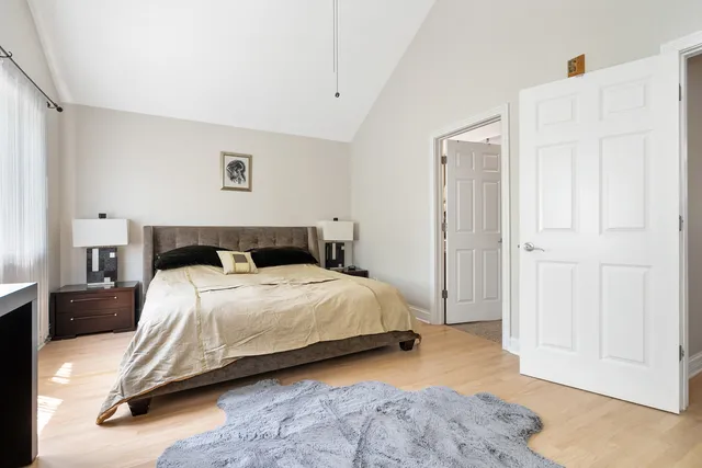 a bedroom with a bed and a cabinets