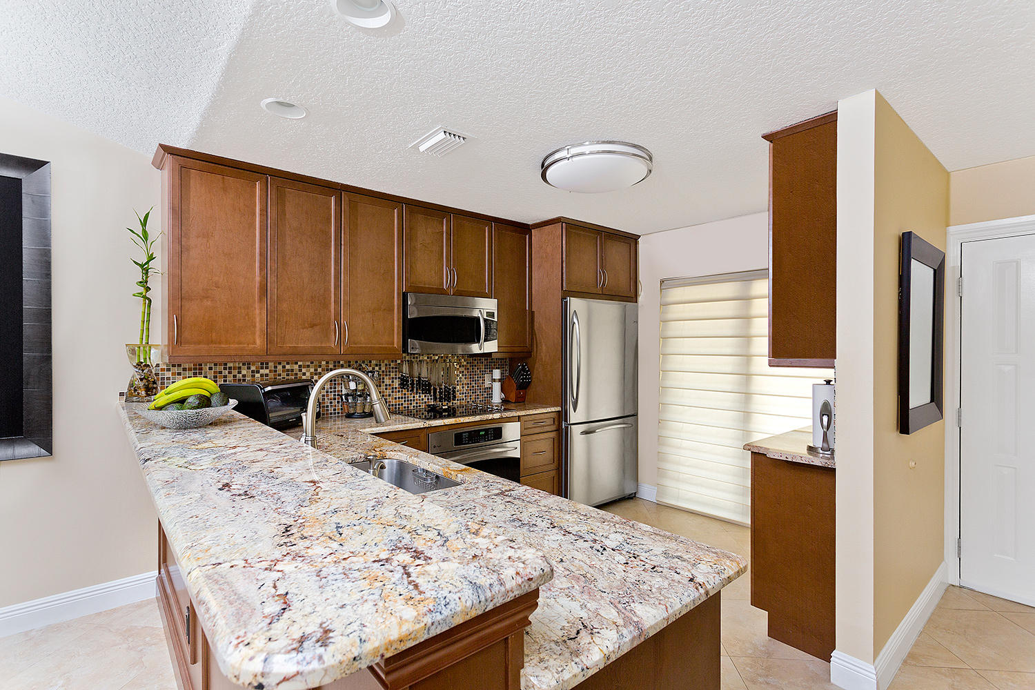 5200 East Club Circle, Unit 2040 Boca Raton, FL 33487 - Photo 8 of 24 07_Kitchen2