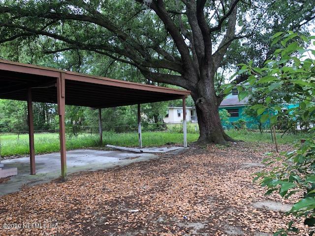 5612 Vernon Road Jacksonville, FL 32209 - Photo 7 of 7 a view of a yard with a tree