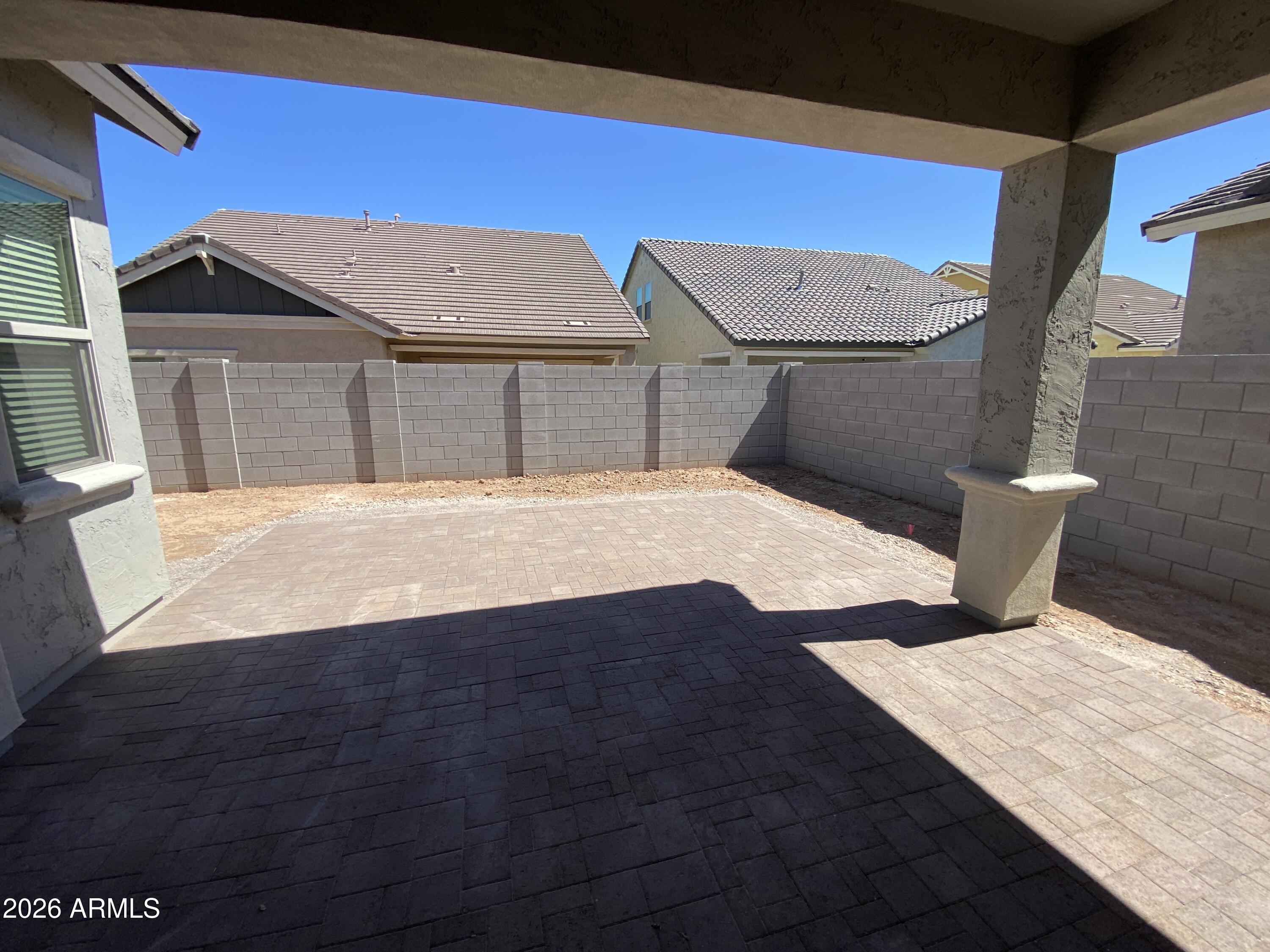 4150 East Bernice Street Gilbert, AZ 85295 - Photo 15 of 25 a view of a bedroom with a bed and wooden floor