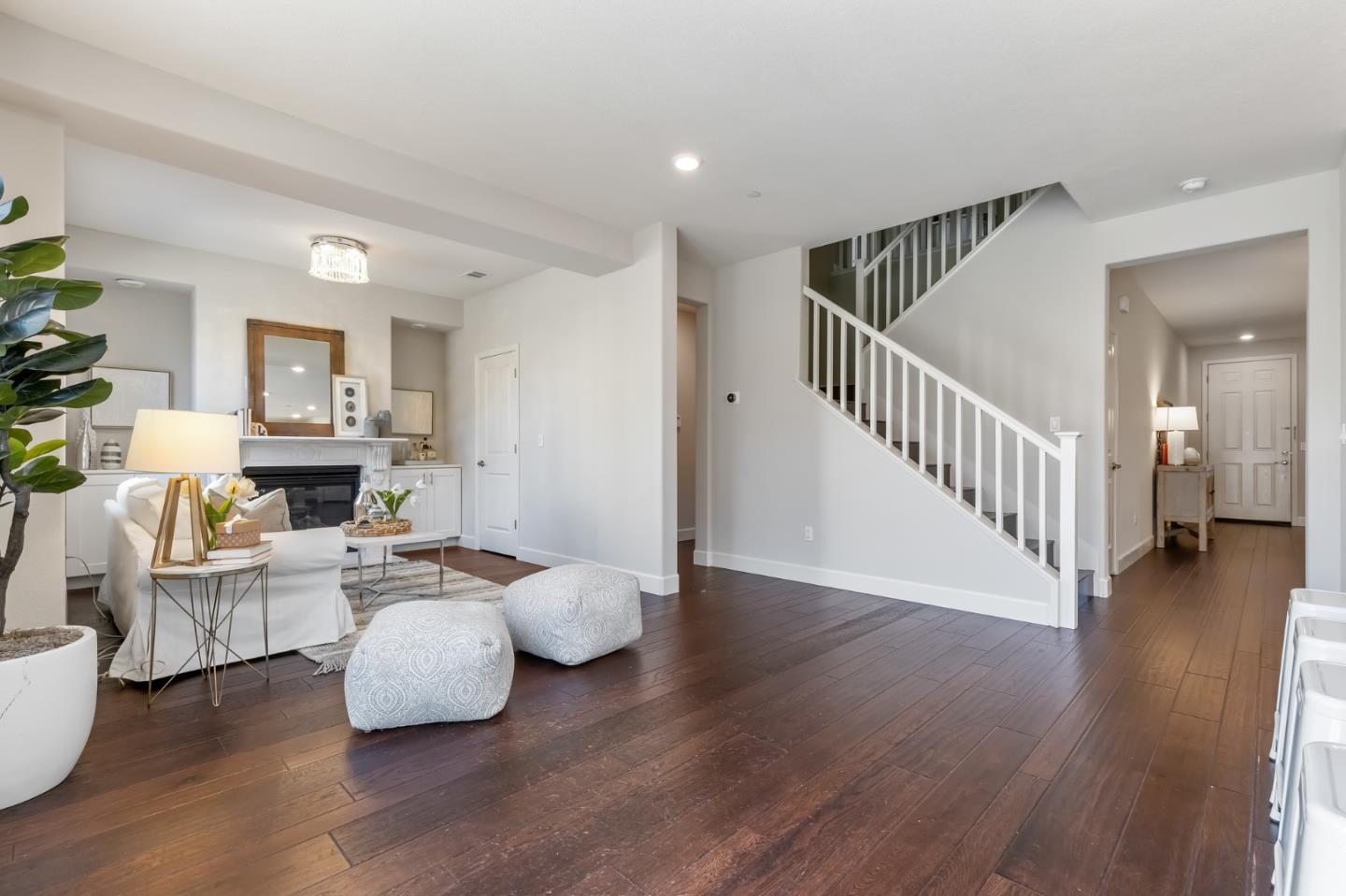 261 Crestview Circle Daly City, CA 94015 - Photo 15 of 45 a living room with fireplace furniture and a wooden floor
