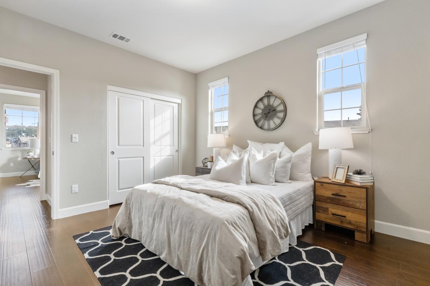 261 Crestview Circle Daly City, CA 94015 - Photo 36 of 45 a bedroom with a bed and wooden floor
