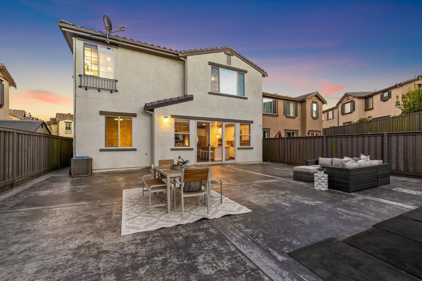 261 Crestview Circle Daly City, CA 94015 - Photo 43 of 45 a view of a patio with table and chairs with wooden fence