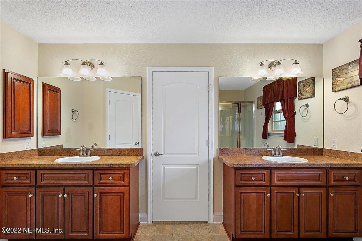 3088 Longleaf Ranch Circle Middleburg, FL 32068 - Photo 14 of 24 14-Primary Bathroom