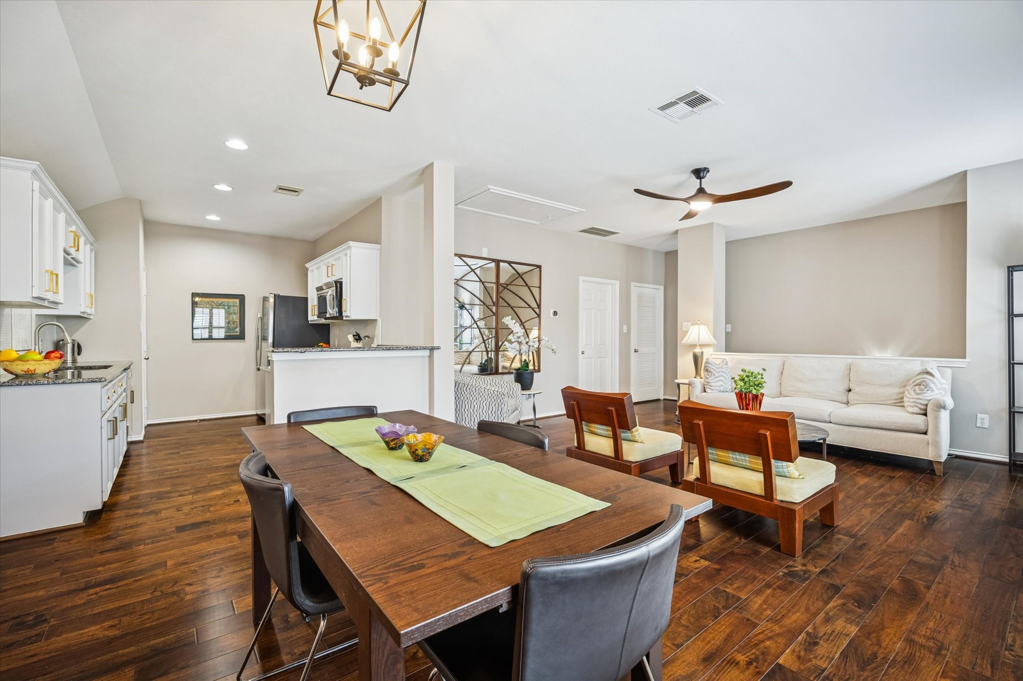 1810 Gillette Street Houston, TX 77019 - Photo 18 of 25 a view of a dining room with furniture and wooden floor