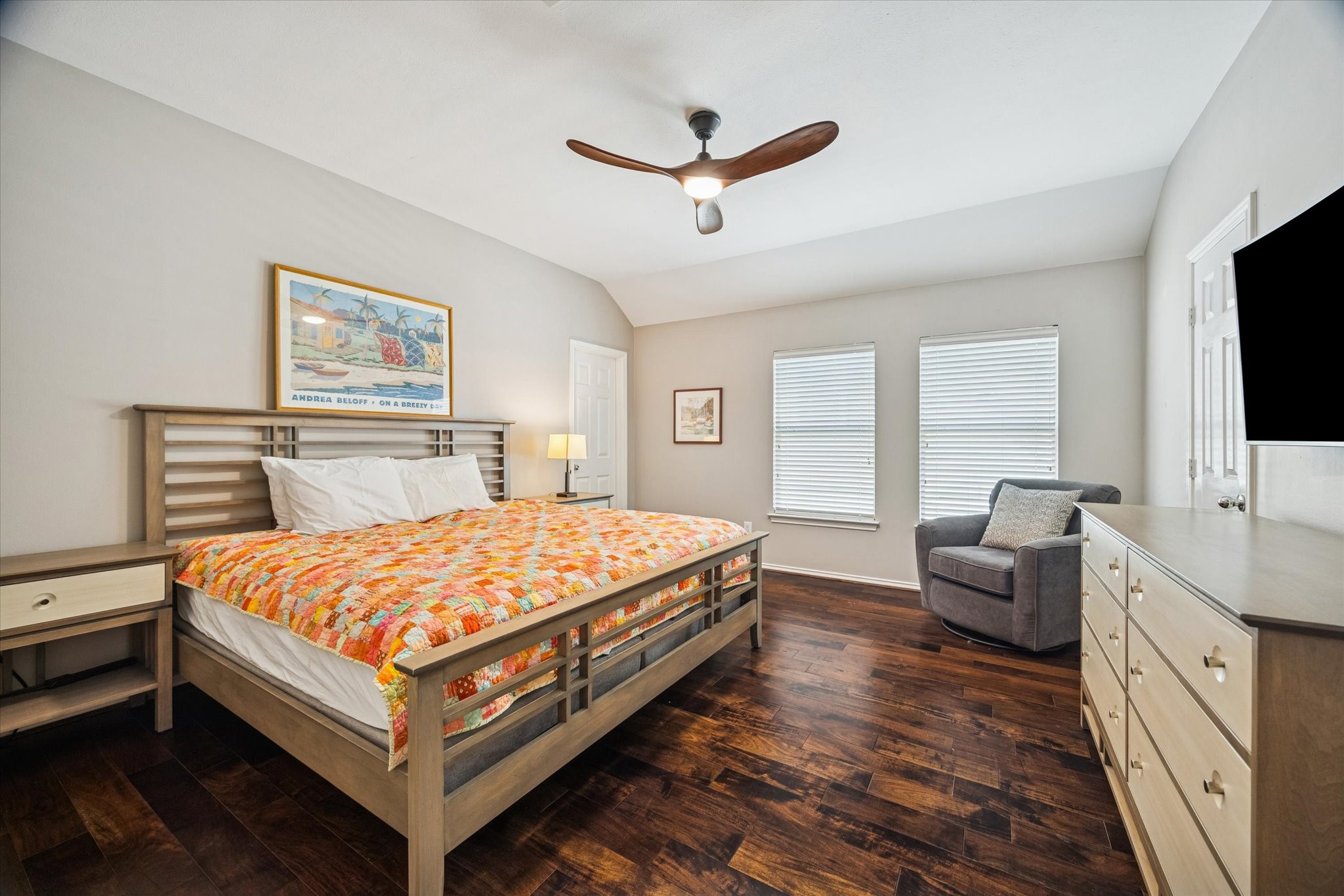 1810 Gillette Street Houston, TX 77019 - Photo 19 of 25 a bedroom with a bed and a flat screen tv