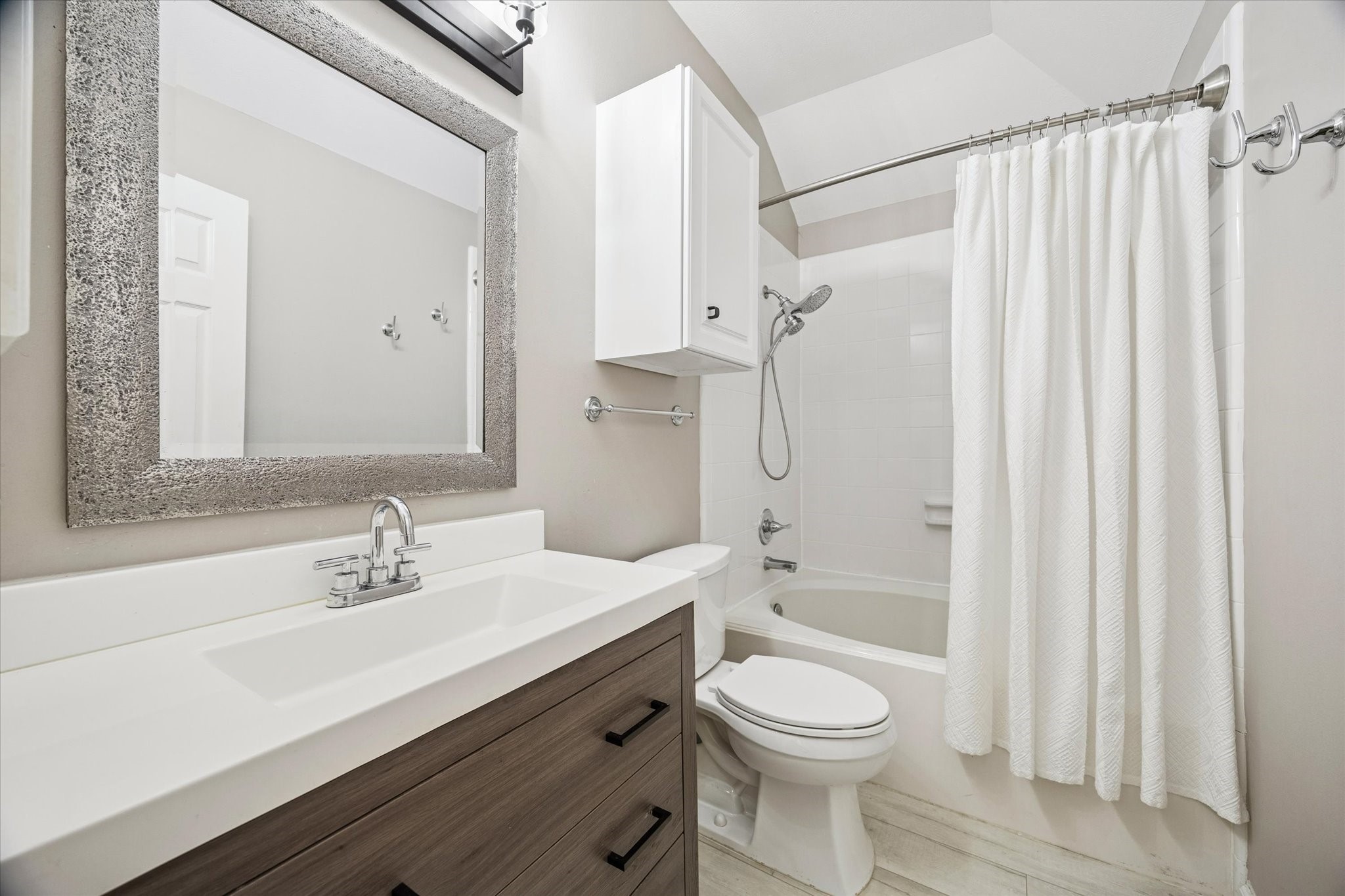 1810 Gillette Street Houston, TX 77019 - Photo 20 of 25 a bathroom with a sink a toilet and shower