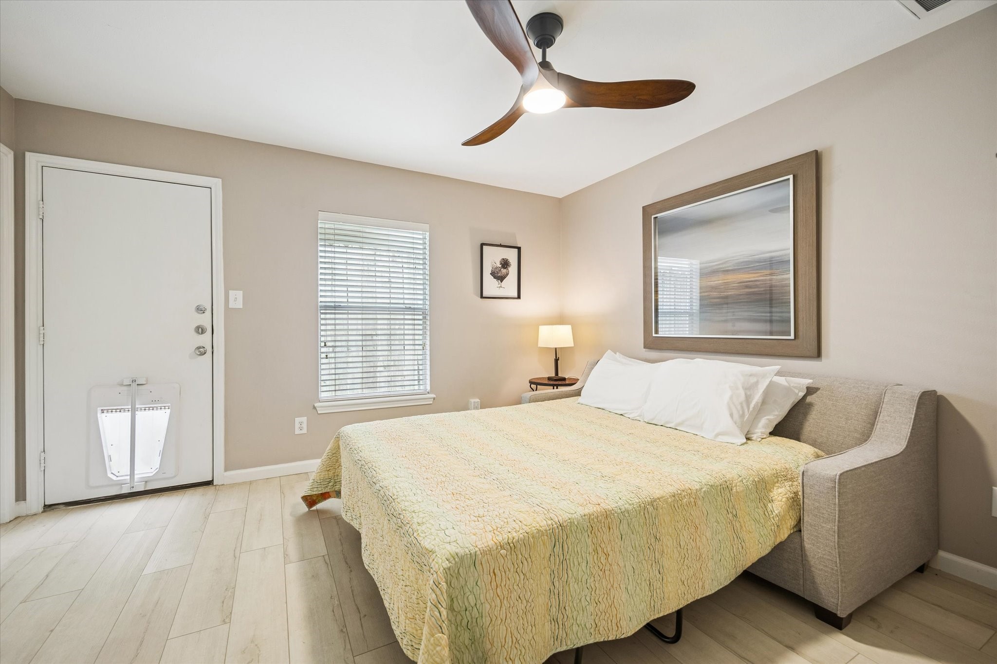 1810 Gillette Street Houston, TX 77019 - Photo 4 of 25 a bedroom with a bed and a painting on the wall