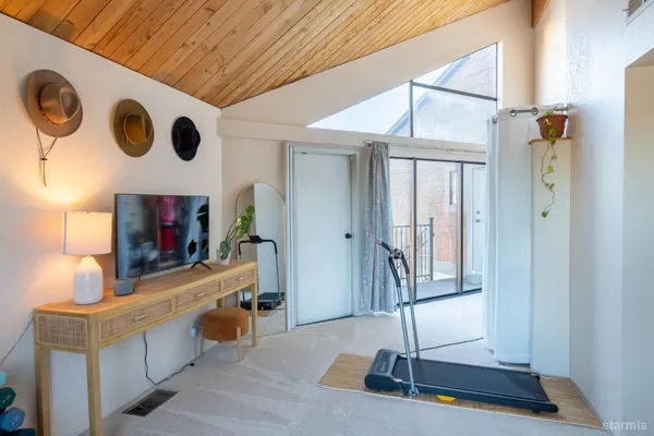 a view of an entryway with a chandelier