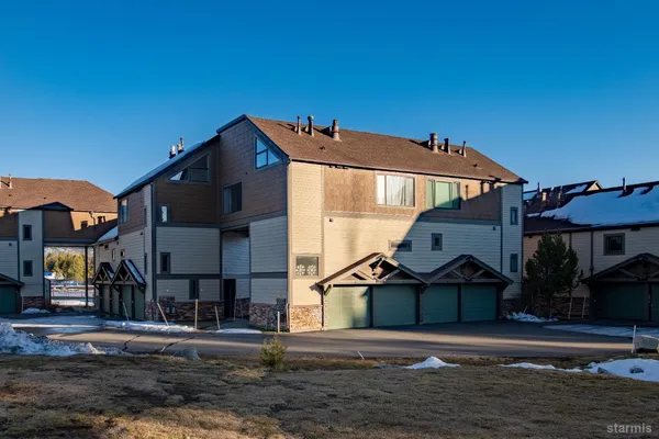 a view of a street in front of a house